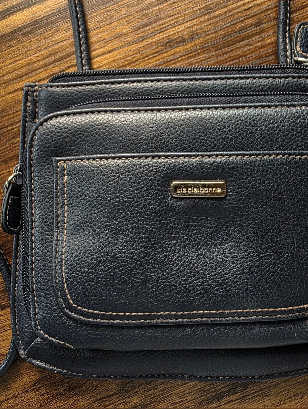Compact Navy Crossbody with Front Pocket and Gold Accent